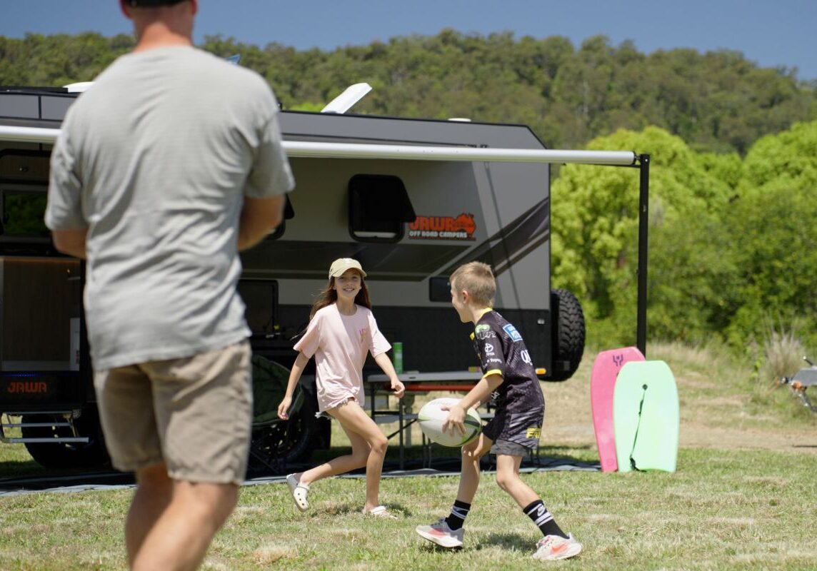 Family off road camping in the summer holidays to beat the heat