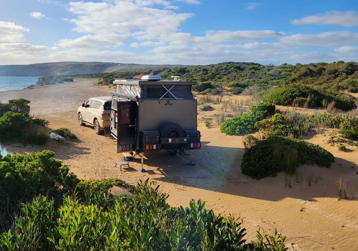One of the best off road campers parked on the beach overlooking bay